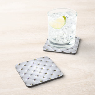 White pintucked leather and gold bead coaster