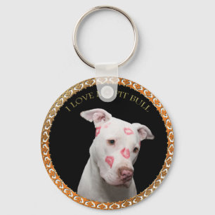 White pitbull with red kisses all over his face. key ring