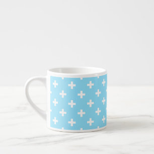 White polka crosses on baby blue espresso cup