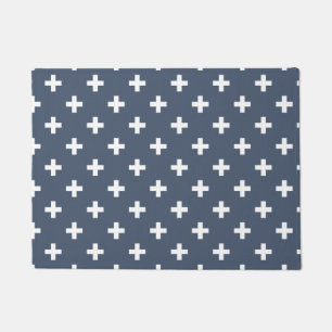 White polka crosses on blue-grey doormat