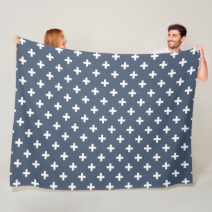 White polka crosses on blue-grey fleece blanket