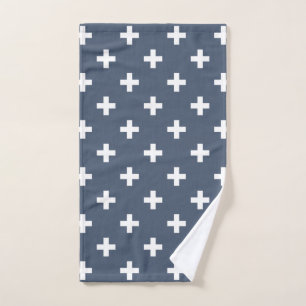 White polka crosses on blue-grey hand towel