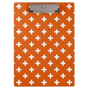 White polka crosses on burnt orange clipboard