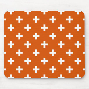 White polka crosses on burnt orange mouse pad