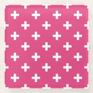 White polka crosses on fuchsia glass coaster