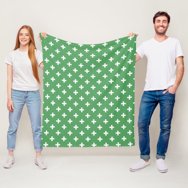 White polka crosses on green fleece blanket (In Situ)