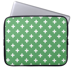 White polka crosses on green laptop sleeve