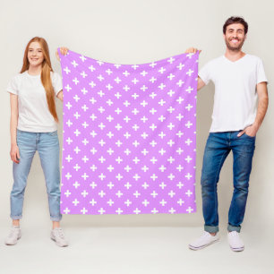 White polka crosses on lilac fleece blanket