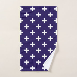 White polka crosses on navy blue hand towel