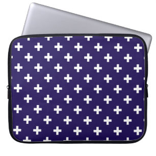 White polka crosses on navy blue laptop sleeve
