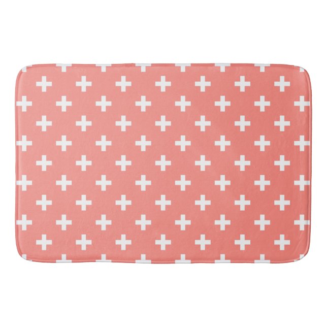 White polka crosses on peach bath mat (Front)