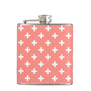 White polka crosses on peach hip flask