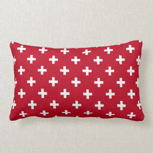 White polka crosses on red lumbar cushion