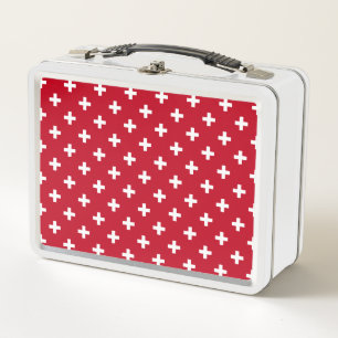 White polka crosses on red metal lunch box