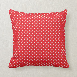 White polka dot on red background cushion