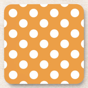 White polka dots on amber coaster
