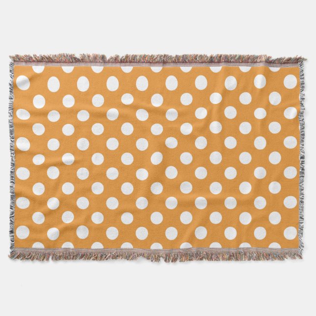 White polka dots on amber throw blanket (Front)