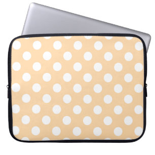 White polka dots on beige laptop sleeve