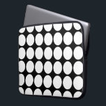 White Polka Dots on Black Laptop Sleeve<br><div class="desc">Bold white polka dots on a black background form a distinctive geometric pattern. 

 

 Digitally created image. 
 Copyright © 2013 Claire E. Skinner. All rights reserved.</div>
