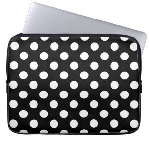 White polka dots on black laptop sleeve