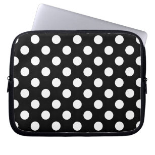 White polka dots on black laptop sleeve
