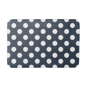 White polka dots on blue-grey bath mat