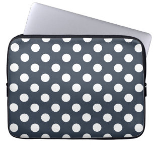 White polka dots on blue-grey laptop sleeve
