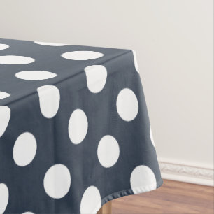 White polka dots on blue-grey tablecloth