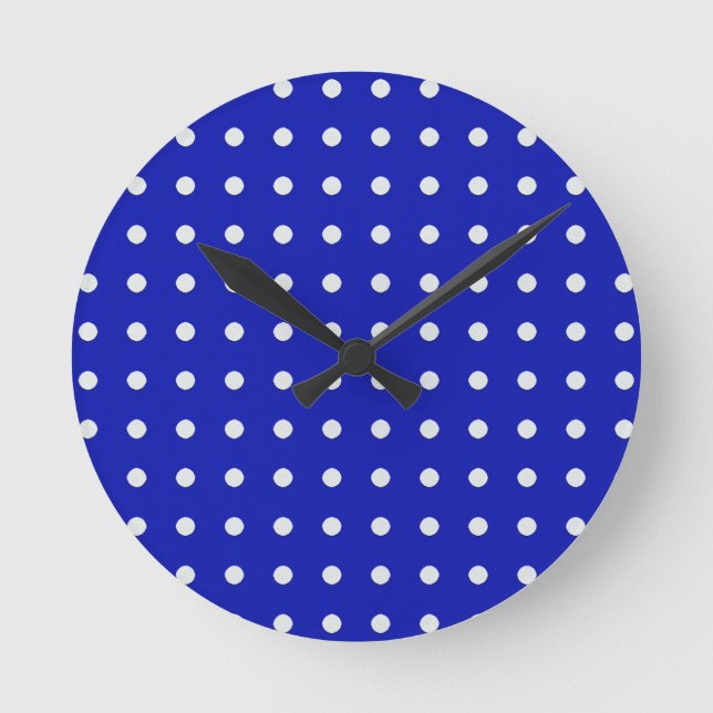 white polka dots on blue round clock (Front)