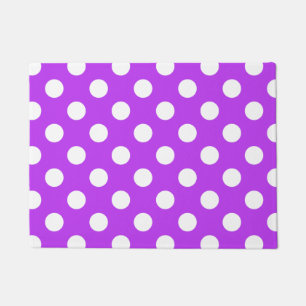 White polka dots on bright purple doormat