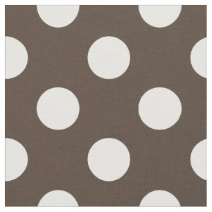 White polka dots on brown fabric