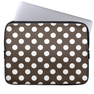 White polka dots on brown laptop sleeve