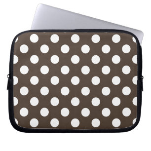 White polka dots on brown laptop sleeve