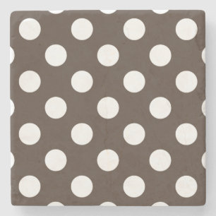 White polka dots on brown stone coaster