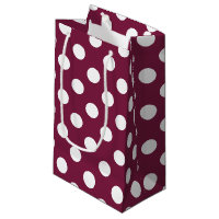 White polka dots on burgundy