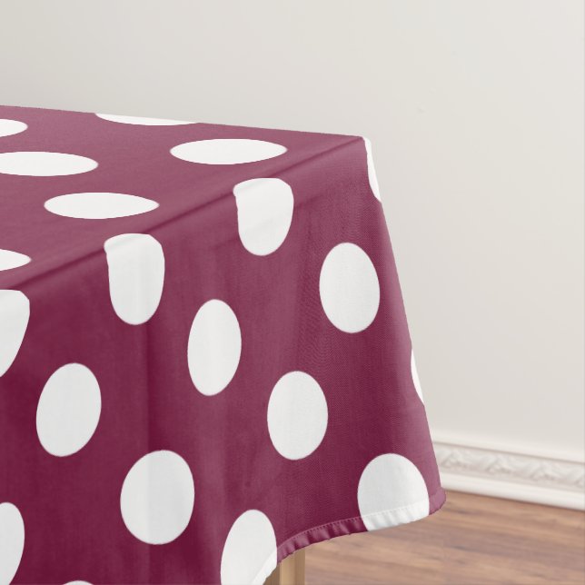 White polka dots on burgundy tablecloth (In Situ)