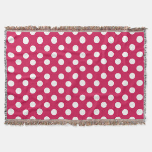 White polka dots on cerise throw blanket