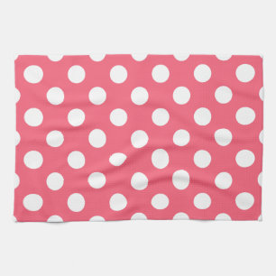 White polka dots on coral tea towel