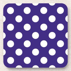 White polka dots on dark blue coaster