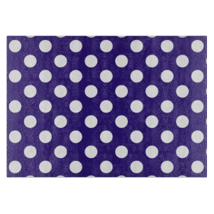 White polka dots on dark blue cutting board