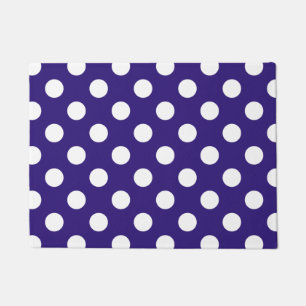 White polka dots on dark blue doormat