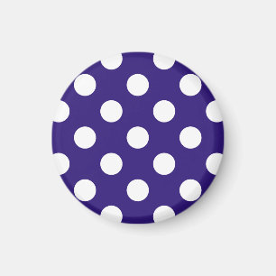 White polka dots on dark blue magnet