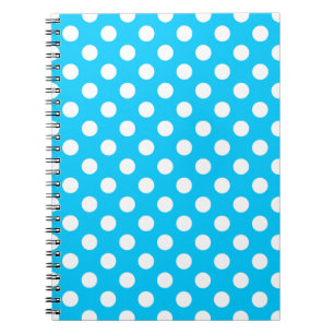 White polka dots on electric blue notebook