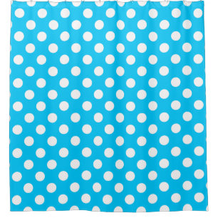 White polka dots on electric blue shower curtain