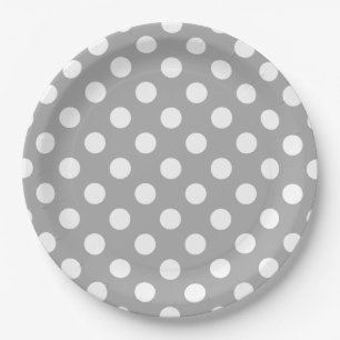 White polka dots on grey paper plate