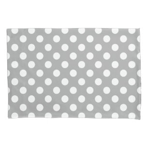 White polka dots on grey pillowcase
