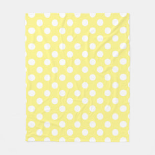 White polka dots on lemon yellow fleece blanket