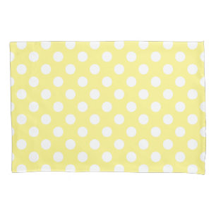 White polka dots on lemon yellow pillowcase