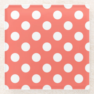 White polka dots on living coral glass coaster