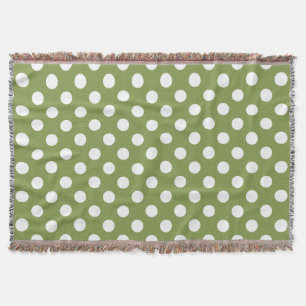 White polka dots on olive green throw blanket